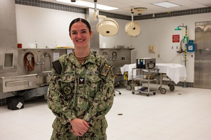 NAVAL STATION ROTA, Spain (September 9, 2023) Hospital Corpsman 2nd Class Julianne Thompson,  a Navy mortician assigned to Navy and Marine Corps Mortuary Detachment Rota, Spain, poses for a photo September 9, 2023. As the "Gateway to the Mediterranean,” NAVSTA Rota provides U.S, NATO and allied forces a strategic hub for operations in Europe, Africa and the Middle East. NAVSTA Rota is a force multiplier, capable of promptly deploying and supporting combat-ready forces through land, air and sea, enabling warfighters and their families, sustaining the fleet and fostering the U.S. and Spanish partnership. (U.S. Navy photo by Mass Communication Specialist 2nd Class Drace Wilson)