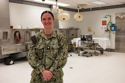 NAVAL STATION ROTA, Spain (September 9, 2023) Hospital Corpsman 2nd Class Julianne Thompson,  a Navy mortician assigned to Navy and Marine Corps Mortuary Detachment Rota, Spain, poses for a photo September 9, 2023. As the "Gateway to the Mediterranean,” NAVSTA Rota provides U.S, NATO and allied forces a strategic hub for operations in Europe, Africa and the Middle East. NAVSTA Rota is a force multiplier, capable of promptly deploying and supporting combat-ready forces through land, air and sea, enabling warfighters and their families, sustaining the fleet and fostering the U.S. and Spanish partnership. (U.S. Navy photo by Mass Communication Specialist 2nd Class Drace Wilson)