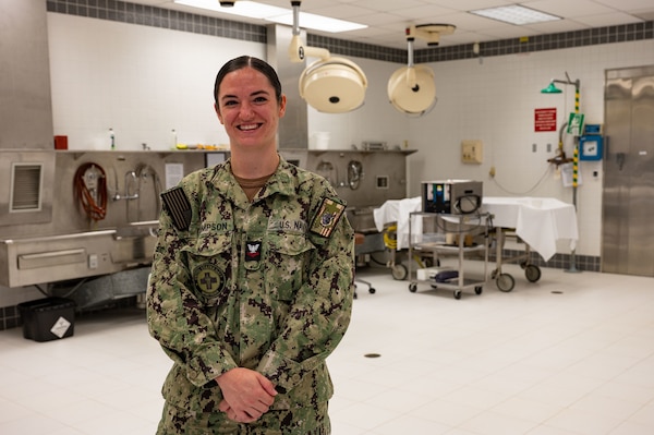 NAVAL STATION ROTA, Spain (September 9, 2023) Hospital Corpsman 2nd Class Julianne Thompson,  a Navy mortician assigned to Navy and Marine Corps Mortuary Detachment Rota, Spain, poses for a photo September 9, 2023. As the "Gateway to the Mediterranean,” NAVSTA Rota provides U.S, NATO and allied forces a strategic hub for operations in Europe, Africa and the Middle East. NAVSTA Rota is a force multiplier, capable of promptly deploying and supporting combat-ready forces through land, air and sea, enabling warfighters and their families, sustaining the fleet and fostering the U.S. and Spanish partnership. (U.S. Navy photo by Mass Communication Specialist 2nd Class Drace Wilson)