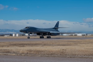 A B-1B Lancer assigned to Dyess Air Force Base departs after hot pit refueling at Buckley Space Force Base, Colorado, Feb. 14, 2024. Hot pit refueling capabilities enhance operational flexibility and responsiveness in dynamic military environments. (U.S. Air Force Photo by Airman 1st Class Emma Anderson)