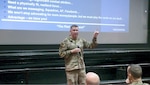 Chief Master Sgt. Chad Bickley, command chief for Air Education and Training Command presents a brief to Airmen at JBSA-Randolph.