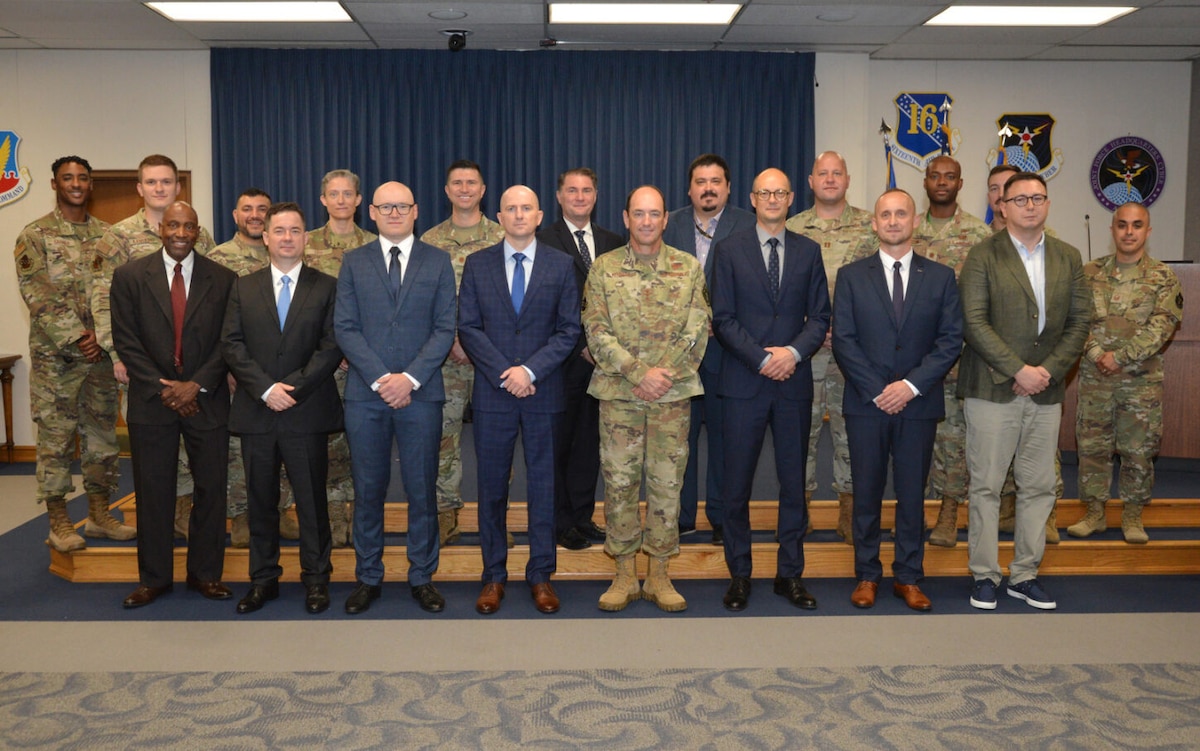 A group of people pose for a photo.