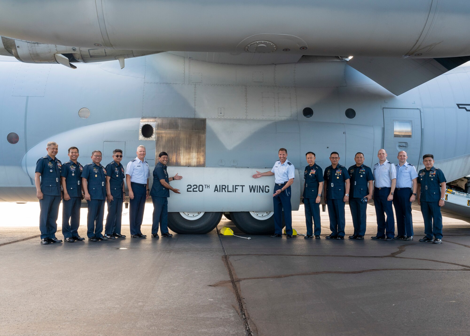 Photo of members from the Philippine Air Force and U.S. Air Force in front of a C-130H