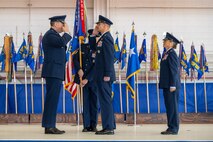 U.S. Air Force Lt. Gen. Tony Bauernfeind, Air Force Special Operations Command commander, left, renders a salute after passing command to Col. Patrick Dierig, 1st Special Operations Wing commander, middle, as Col. Allison Black, 1st SOW outgoing commander, right, stands at the position of attention during the 1st SOW change of command ceremony at Hurlburt Field, Florida, Feb. 23, 2024.