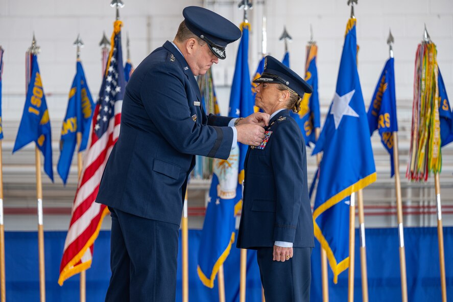 U.S. Air Force Lt. Gen. Tony Bauernfeind, Air Force Special Operations Command commander, left, pins the Legion of Merit medal on Col. Allison Black, 1st Special Operations Wing outgoing commander, during the 1st SOW change of command ceremony at Hurlburt Field, Florida, Feb. 23, 2024.