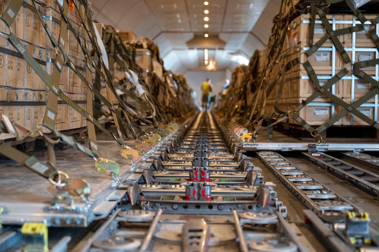 Cargo sits in the rear of an aircraft.