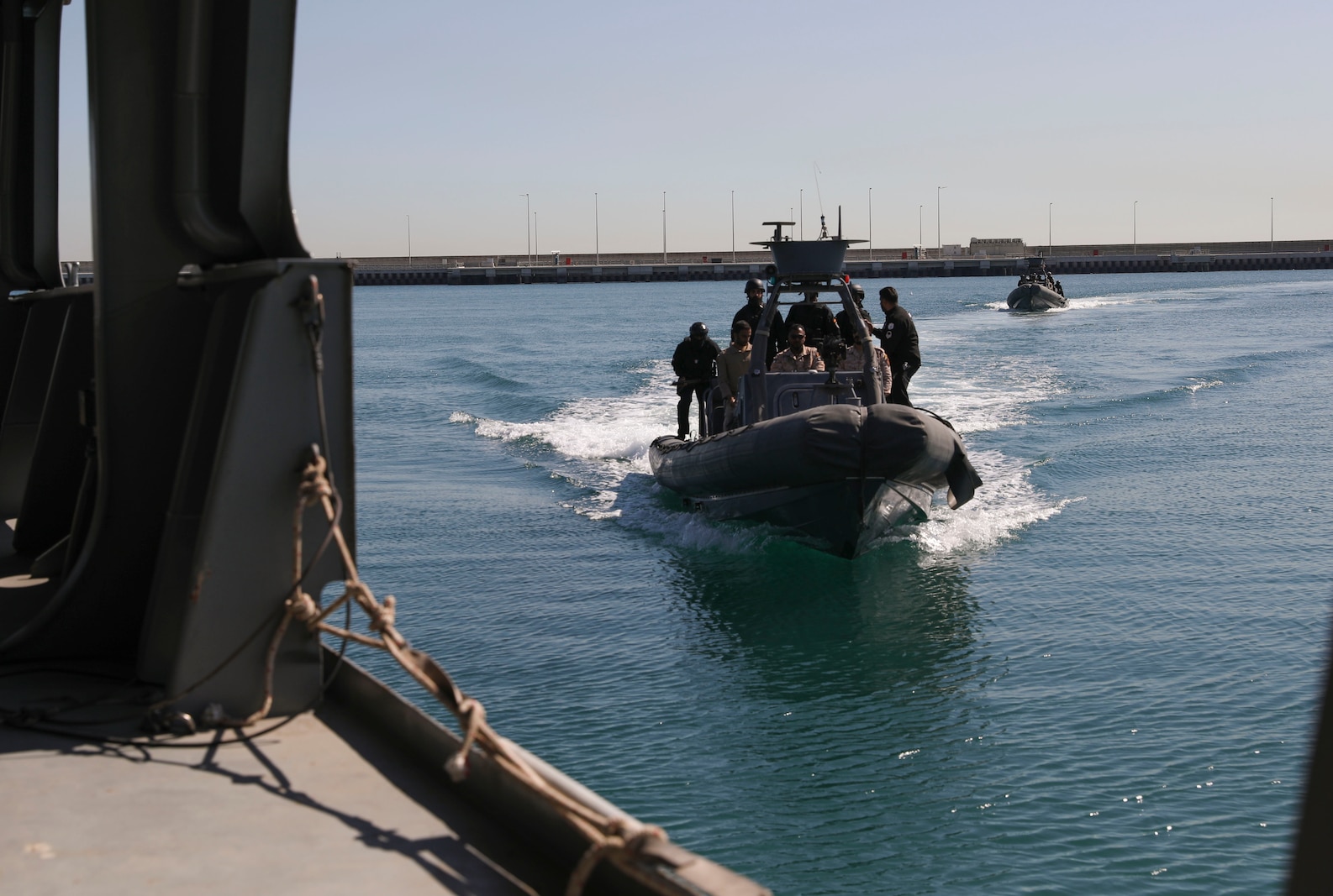 240203-M-IU565-2010 MUHAMMAD AL AHMED NAVAL BASE, Kuwait (Feb. 3, 2024) Partner nation service members conduct a visit, board, search, and seizure demonstration during exercise Eager Defender 24 onboard Muhammad Al Ahmed Naval Base, Kuwait, Feb. 3. Eager Defender 24 is the capstone in a series of bilateral exercises between Kuwait and U.S. naval forces, focused on enhancing mutual capabilities and interoperability in maritime security operations. (U.S. Marine Corps photo)