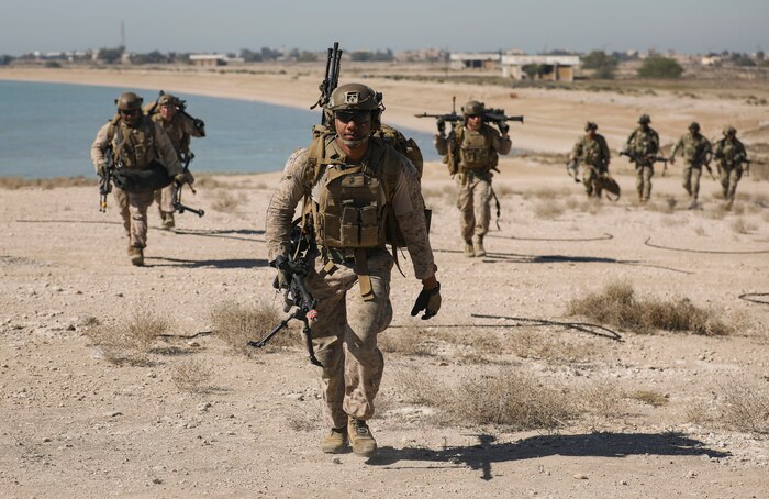240206-M-IU565-1194 FAILAKA ISLAND, Kuwait (Feb. 6, 2024) Marines assigned to Fleet Anti-Terrorism Security Team Central Command conduct a patrol while participating in the final evolution of exercise Eager Defender 24 on Failaka Island, Kuwait, Feb. 6. Eager Defender 24 is the capstone in a series of bilateral exercises between Kuwait and U.S. naval forces, focused on enhancing mutual capabilities and interoperability in maritime security operations. (U.S. Marine Corps photo)