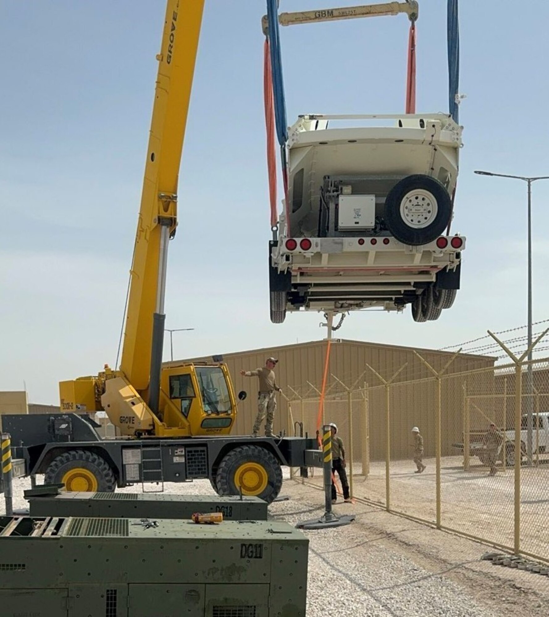 U.S. Space Forces Central Guardians emplace satellite communications equipment at a new facility in an undisclosed location in the U.S. Central Command area of responsibility, Feb. 6, 2024.