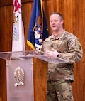 Sgt. Maj. Kevin Driscoll, of Oswego, Illinois, 129th Regiment (Regional Training Institute) operations sergeant major, thanks family and friends for many years of support during his 26 years of military service during a retirement ceremony Feb. 24 at the Illinois Military Academy, Camp Lincoln, Springfield, Illinois.
