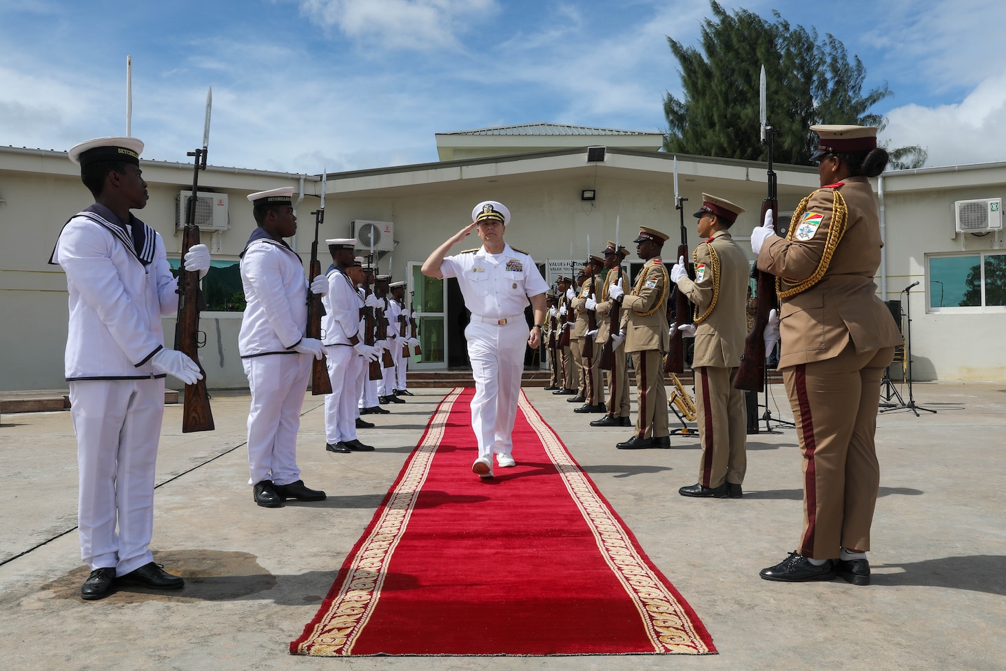 VICTORIA, Seychelles (Feb. 26, 2024) Rear Adm. Calvin M. Foster, U.S. 6th Fleet Vice Commander, departs the opening ceremony for exercise Cutlass Express 2024 (CE 24). Cutlass Express 2024, conducted by U.S. Naval Forces Africa and sponsored by U.S. Africa Command, increases the readiness of U.S. forces; enhances maritime domain awareness and collaboration among participating nations; and strengthens the capability of partner nations to combat piracy and counter illicit trafficking and illegal, unreported, and unregulated fishing.