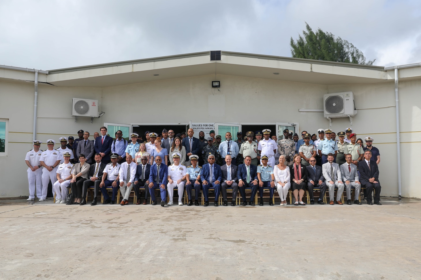 VICTORIA, Seychelles (Feb. 26, 2024) Representatives from nations participating in exercise Cutlass Express 2024 (CE 24) pose for a group photo during the exercise’s opening ceremony. Cutlass Express 2024, conducted by U.S. Naval Forces Africa and sponsored by U.S. Africa Command, increases the readiness of U.S. forces; enhances maritime domain awareness and collaboration among participating nations; and strengthens the capability of partner nations to combat piracy and counter illicit trafficking and illegal, unreported, and unregulated fishing.