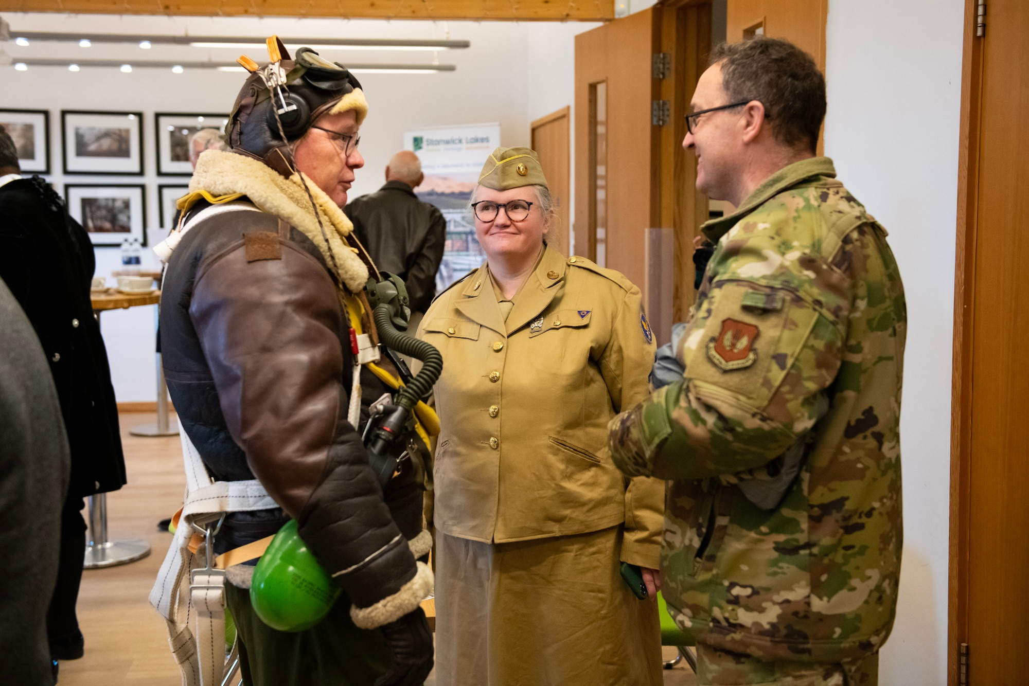 U.S. Air Force Lt. Col. Liam Clancy, right, 501st Combat Support Wing Director of Staff, speaks with distinguished guests before a Ceremony of Remembrance at Stanwick Lakes, England, Feb. 22, 2024. U.S. and U.K. leaders gathered to honor 17 Airmen who died in a midair collision on Feb. 22, 1944, involving B-17 Flying Fortresses from the 303rd Bombardment Group at RAF Molesworth and the 384th Bombardment Group at RAF Grafton Underwood. The Airmen were part of Operation Argument, or "The Big Week," targeting enemy industrial sites and aircraft facilities in Central Europe to secure Allied air superiority for the upcoming landings in France in June 1944. (U.S. Air Force photo by Staff Sgt. Jennifer Zima)