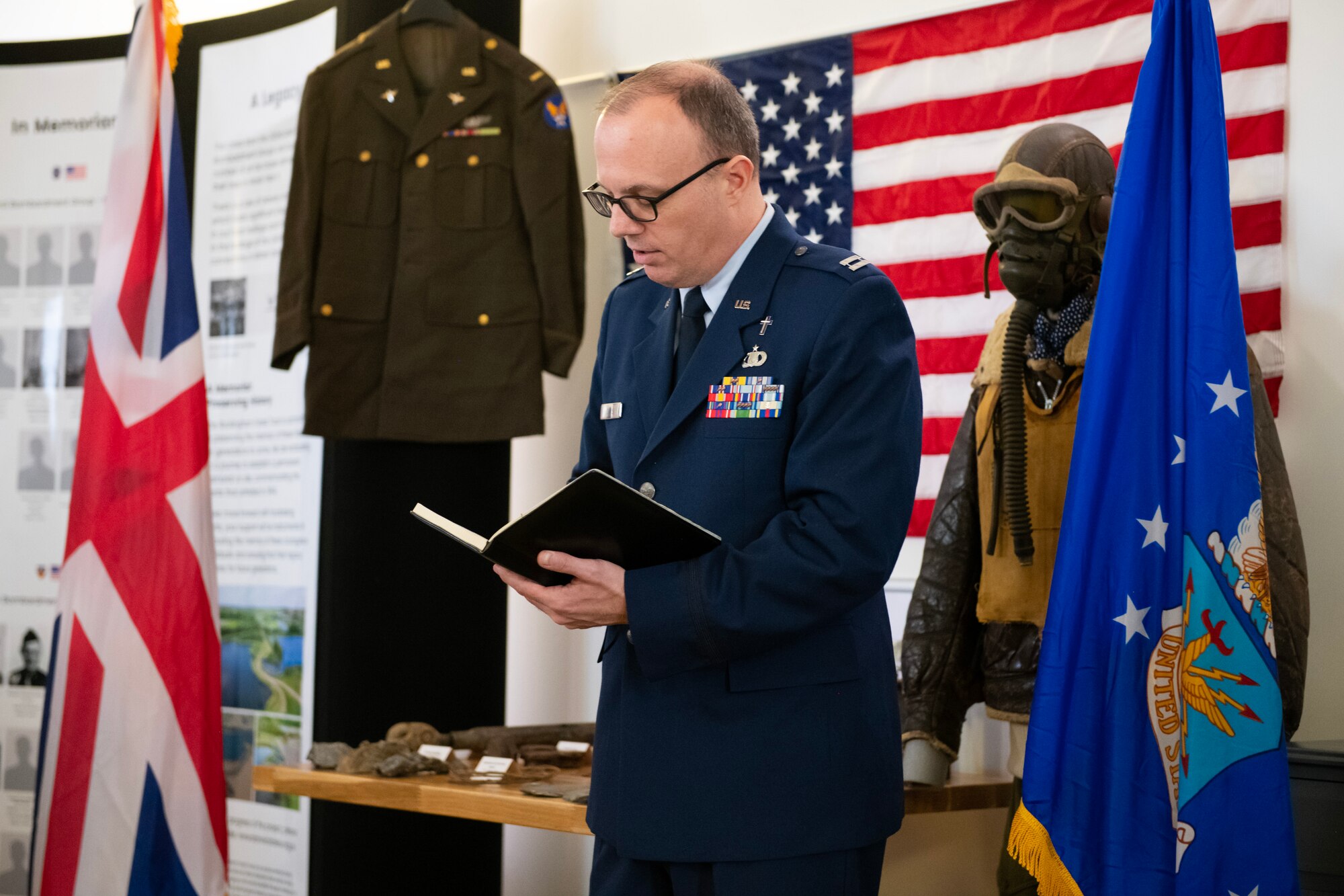 U.S. Air Force Chaplain (Capt) Steven Davis, 501st Combat Support Wing chaplain, delivers an invocation during a Ceremony of Remembrance at Stanwick Lakes, England, Feb. 22, 2024. U.S. and U.K. leaders gathered to honor 17 Airmen who died in a midair collision on Feb. 22, 1944, involving B-17 Flying Fortresses from the 303rd Bombardment Group at RAF Molesworth and the 384th Bombardment Group at RAF Grafton Underwood. The Airmen were part of Operation Argument, or "The Big Week," targeting enemy industrial sites and aircraft facilities in Central Europe to secure Allied air superiority for the upcoming landings in France in June 1944. (U.S. Air Force photo by Staff Sgt. Jennifer Zima)