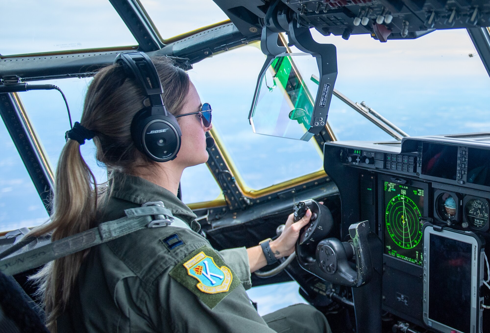 A pilot flys a C-130