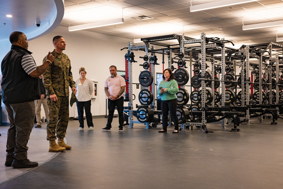 Raymond E. Anderson, left, director of strength and conditioning with Marine Corps Community Services, shows around U.S. Marine Corps Sgt. Maj. Carlos A. Ruiz, Sergeant Major of the Marine Corps, in the future Warrior Athlete Readiness and Resilience Center, currently under construction, on Marine Corps Base Camp Lejeune, North Carolina, Feb. 22, 2024. This facility will house a holistic, collaborative program that will enhance combat readiness in conjunction with warfighter resiliency by strengthening the mental, social, spiritual, and physical fitness necessary to overcome any challenge. (U.S. Marine Corps photo by Lance Cpl. Loriann Dauscher)