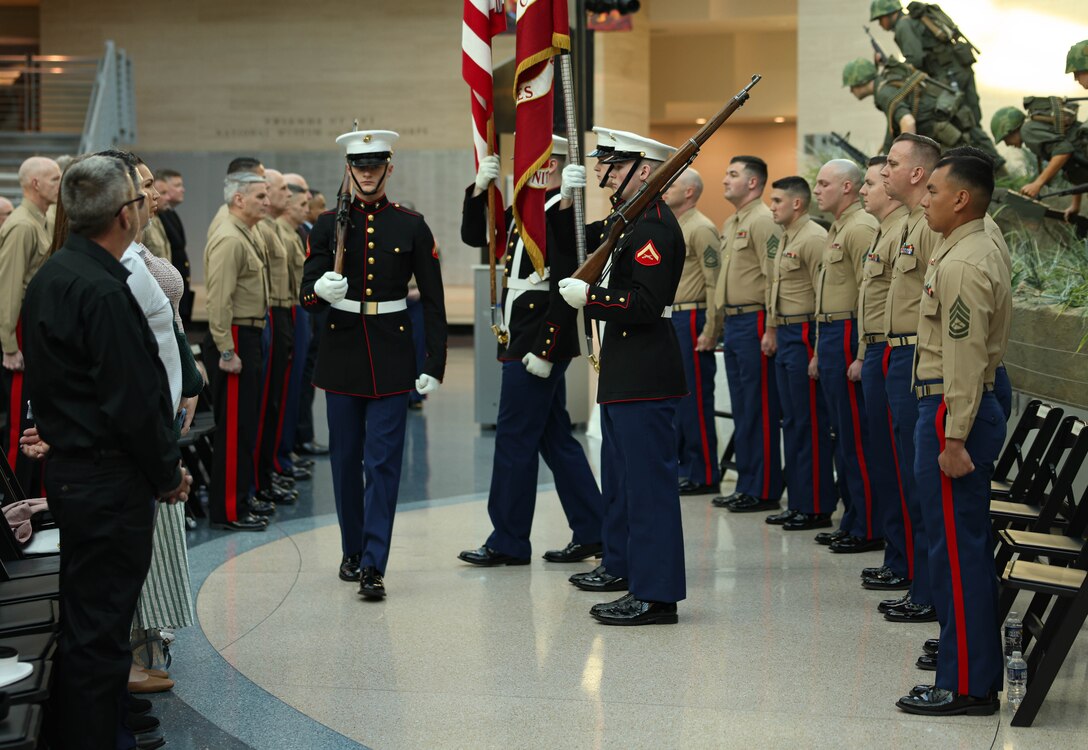 U.S. Marines with the Marine Corps Base Quantico Color Guard present the colors during the Fiscal Year 2023 Commandant’s Combined Awards Ceremony at the National Museum of the Marine Corps, Triangle, Virginia, Feb. 8, 2024. The ceremony recognized and awarded eight Marines with the Navy and Marine Corps Commendation Medal for their exceptional performance in their respective special duty assignments.  (U.S. Marine Corps photo by Lance Cpl. David Brandes)