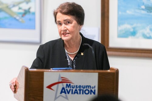 Woman standing at podium
