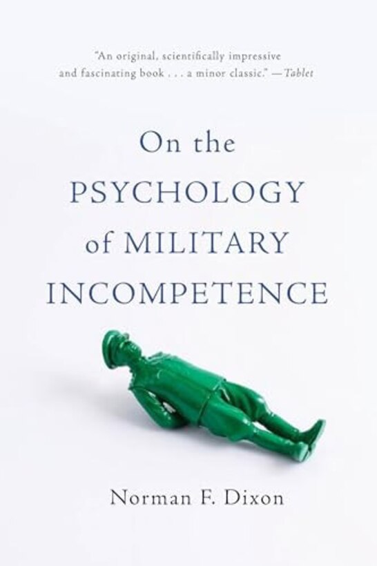 Cover of book with toy green soldier laying down on it