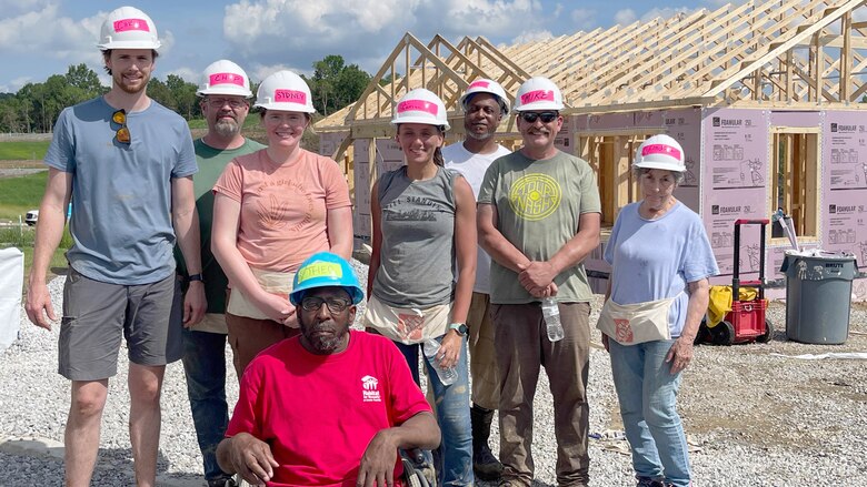 (Left to Right) Chris Stoltz, Chip Hall, Sydney Curnes, Theo Caldwell, Carisa Norman, Gary Caldwell, Mike Lee and Linda Lee pose May 14, 2023, during construction of a Habitat for Humanity home for Theo in Nashville, Tennessee. He is a mail clerk in the U.S. Army Corps of Engineers Nashville District. (USACE Photo)