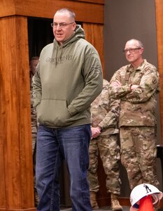 Following the presentation of various gifts, Master Sgt. Kenneth Ray, Branch Chief, 1st Battalion, 129th Regiment (Regional Training Institute), thanks family and friends for many years of support during his 20 years of military service during a retirement ceremony Feb. 25 at the Illinois Military Academy, Camp Lincoln, Springfield, Illinois.