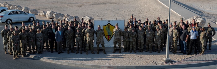 Attendees at the second annual U.S. Central Command Theater Space Forum pose for a photo at an undisclosed location in the CENTCOM area of responsibility, Feb. 8, 2024.