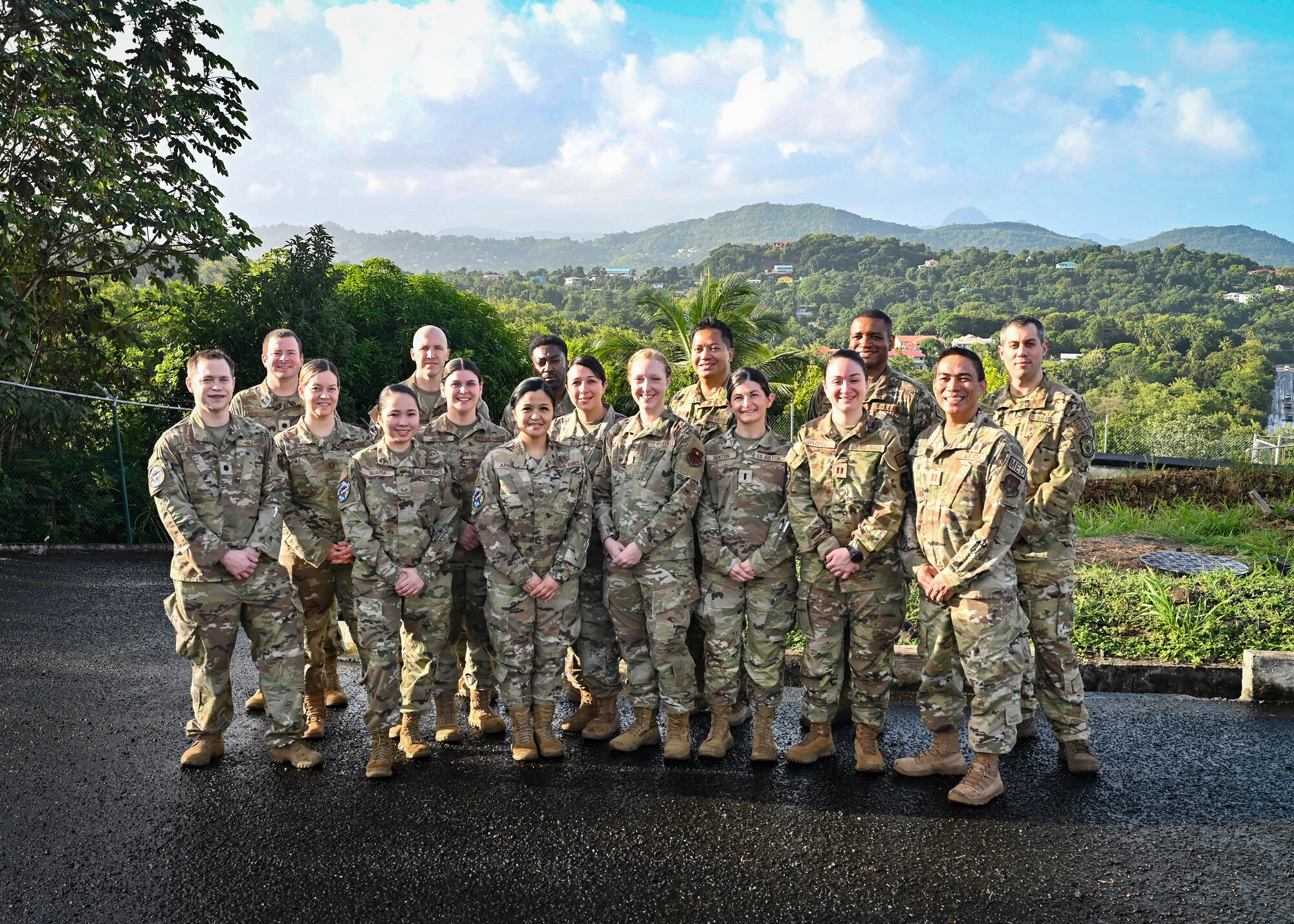 Partner nation medical personnel and U.S. Air Force team members of the St. Lucia Lesser Antilles Medical Assistance Team gather for a group photo during an opening ceremony at Owen King European Union Hospital, Castries, St. Lucia, Feb. 26, 2024.