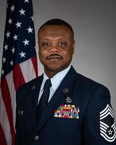 Chief Master Sgt. Aaron Flanigan, a Senior Enlisted Leader with the 932nd Maintenance Squadron, poses for an official photo December 3rd, 2024, Scott Air Force Base, Illinois. (U.S. Air Force photo by Christopher Parr)