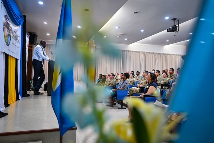 Partner nation medical personnel and U.S. Air Force team members of the St. Lucia Lesser Antilles Medical Assistance Team gather for a group photo during an opening ceremony at Owen King European Union Hospital, Castries, St. Lucia, Feb. 26, 2024.