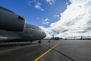A C-17 Globemaster III from the 58th Airlift Squadron (AS) sits on the flightline at Joint Base Lewis-McChord, Washington, Feb. 22, 2024. Airmen from the 58th AS participated in a large formation exercise that included aircrews from the 58th AS, 8th AS, and the 7th AS. (U.S. Air Force photo by Senior Airman Trenton Jancze)
