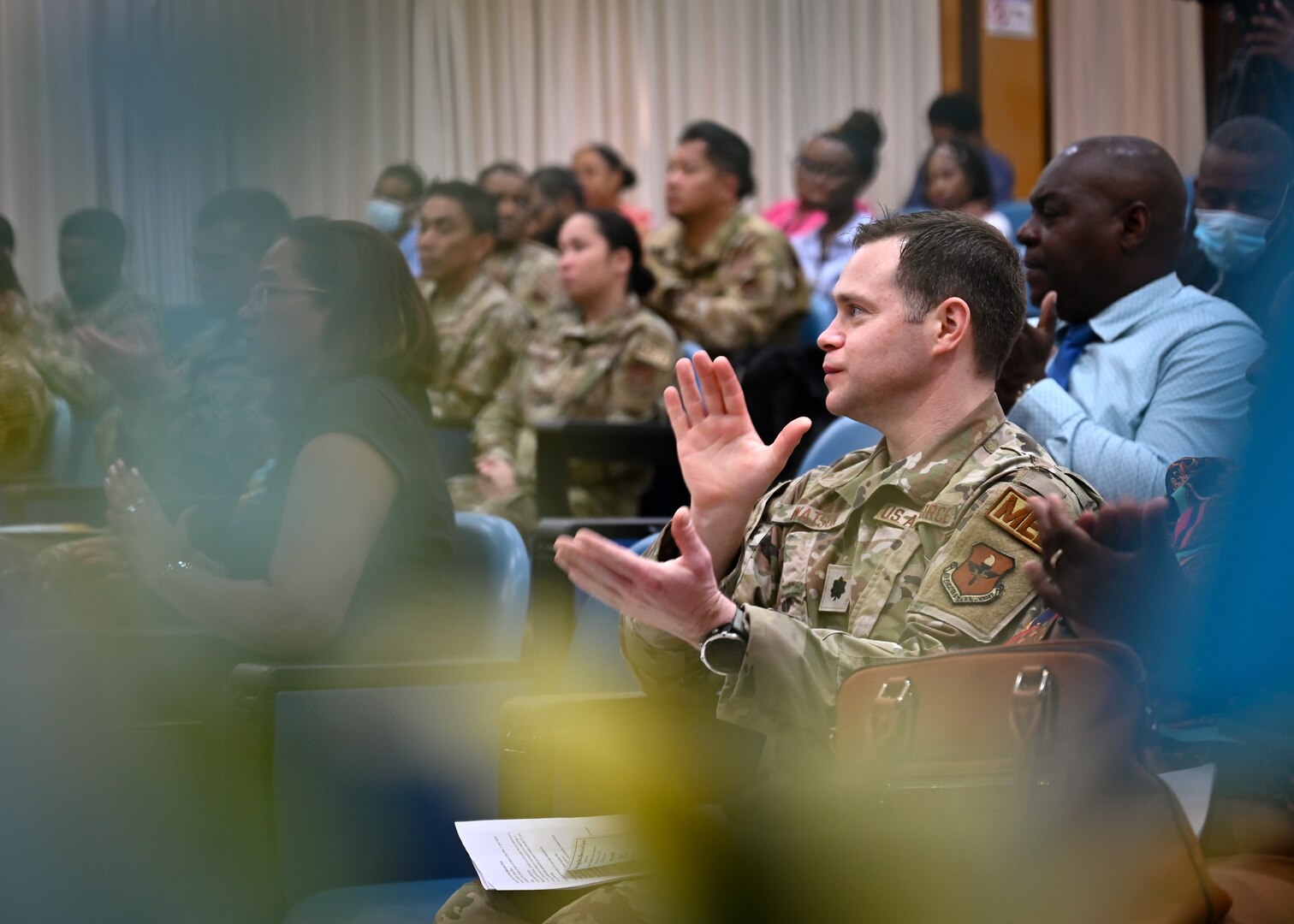 Partner nation medical personnel and U.S. Air Force team members of the St. Lucia Lesser Antilles Medical Assistance Team gather for a group photo during an opening ceremony at Owen King European Union Hospital, Castries, St. Lucia, Feb. 26, 2024.