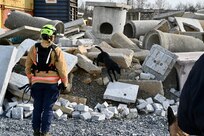 Maryland Task Force 1 (MD-TF1) and Virginia Task Force 1 (VA-TF1) of the Federal Emergency Management Agency (FMEA) train during an Urban Search and Rescue Task Force exercise, at Montgomery County Airpark and Public Safety Training Academy (PSTA), Feb. 15, 2024. The training represents a new partnership for members of the D.C. National Guard’s Aviation Detachment, nicknamed District Dustoff, designed to improve interoperability and familiarity between partners involved in disaster response in the DMV.