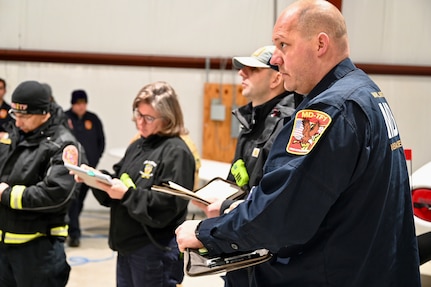 Maryland Task Force 1 (MD-TF1) and Virginia Task Force 1 (VA-TF1) of the Federal Emergency Management Agency (FMEA) train during an Urban Search and Rescue Task Force exercise, at Montgomery County Airpark and Public Safety Training Academy (PSTA), Feb. 15, 2024. The training represents a new partnership for members of the D.C. National Guard’s Aviation Detachment, nicknamed District Dustoff, designed to improve interoperability and familiarity between partners involved in disaster response in the DMV.