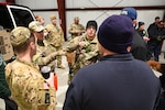 Maryland Task Force 1 (MD-TF1) and Virginia Task Force 1 (VA-TF1) of the Federal Emergency Management Agency (FMEA) train during an Urban Search and Rescue Task Force exercise, at Montgomery County Airpark and Public Safety Training Academy (PSTA), Feb. 15, 2024. The training represents a new partnership for members of the D.C. National Guard’s Aviation Detachment, nicknamed District Dustoff, designed to improve interoperability and familiarity between partners involved in disaster response in the DMV.