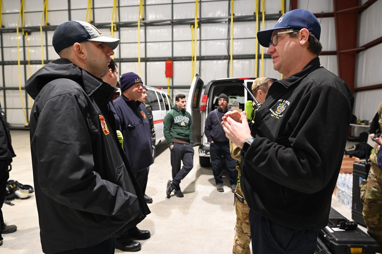 Maryland Task Force 1 (MD-TF1) and Virginia Task Force 1 (VA-TF1) of the Federal Emergency Management Agency (FMEA) train during an Urban Search and Rescue Task Force exercise, at Montgomery County Airpark and Public Safety Training Academy (PSTA), Feb. 15, 2024. The training represents a new partnership for members of the D.C. National Guard’s Aviation Detachment, nicknamed District Dustoff, designed to improve interoperability and familiarity between partners involved in disaster response in the DMV.