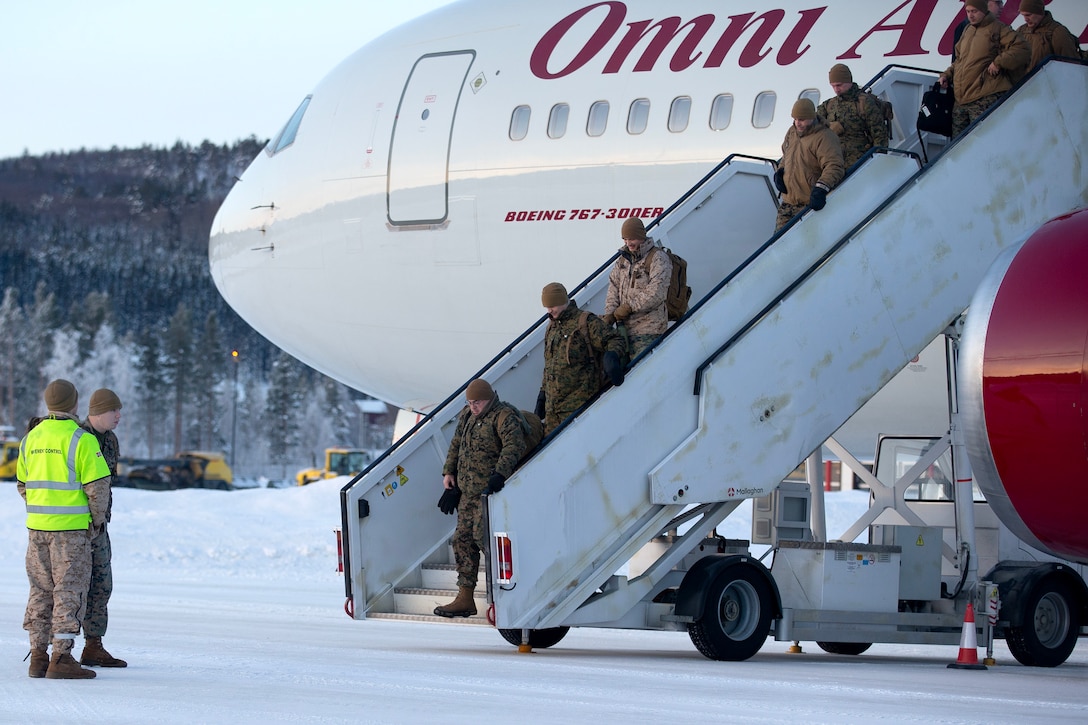 U.S. Marines from II Marine Expeditionary Force disembark a plane after landing in Bardufoss, Norway, Feb. 12, 2024, to take part in the NATO exercise Nordic Response 24. Around 2,500 U.S. Marines will join the exercise alongside NATO allies and Sweden. The goal is to strengthen coordination across air, ground, maritime and other domains into a unified fighting force ready to respond to any threat. NR 24 is a Norwegian national readiness and defense exercise designed to enhance military capabilities and allied cooperation in high-intensity warfighting in a challenging arctic environment. This exercise will test military activities ranging from the reception of allied and partner reinforcements and command and control interoperability to combined joint operations, maritime prepositioning force logistics, integration with NATO militaries, and reacting against an adversary force during a dynamic training environment. (U.S. Marine Corps photo by Master Sgt. Jon Holmes)