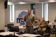 Sgt. 1st Class Wesley Swanson defends his statement during the Battle Rhythm working group, Jan. 18. 2024, in the Bishop Henry Whipple Federal Building Fort Snelling, Minnesota. 
(Photo Credit: Amber Brooks)