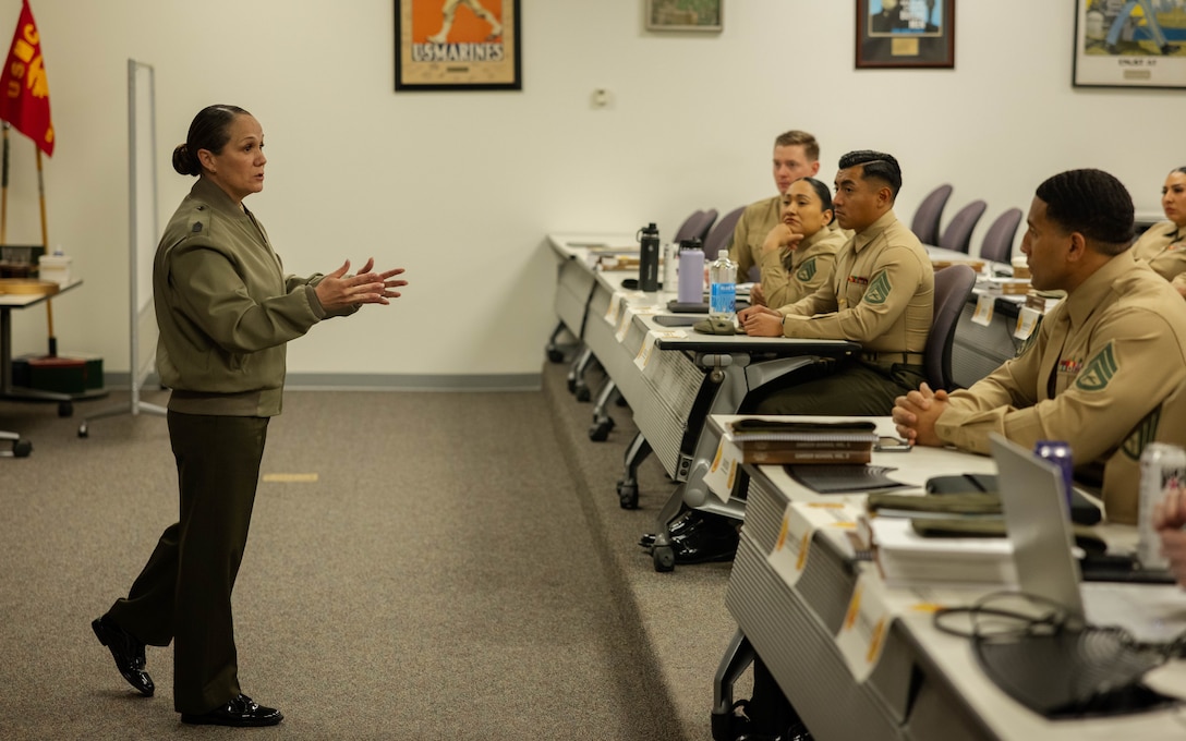 U.S. Marine Corps Sgt Maj Jacqueline Townsel, sergeant major, Marine and Family Programs Division, gives a speech during the Career School at the Staff Non-Commissioned Officer Academy on Marine Corps Base Quantico, Virginia, Feb. 23, 2024. The SNCO Academy educates and develops enlisted Marines to be ethical, moral and professional leaders capable of making sound decisions even in times of ambiguity. (U.S. Marine Corps Photo by Sgt. Mitchell Johnson)