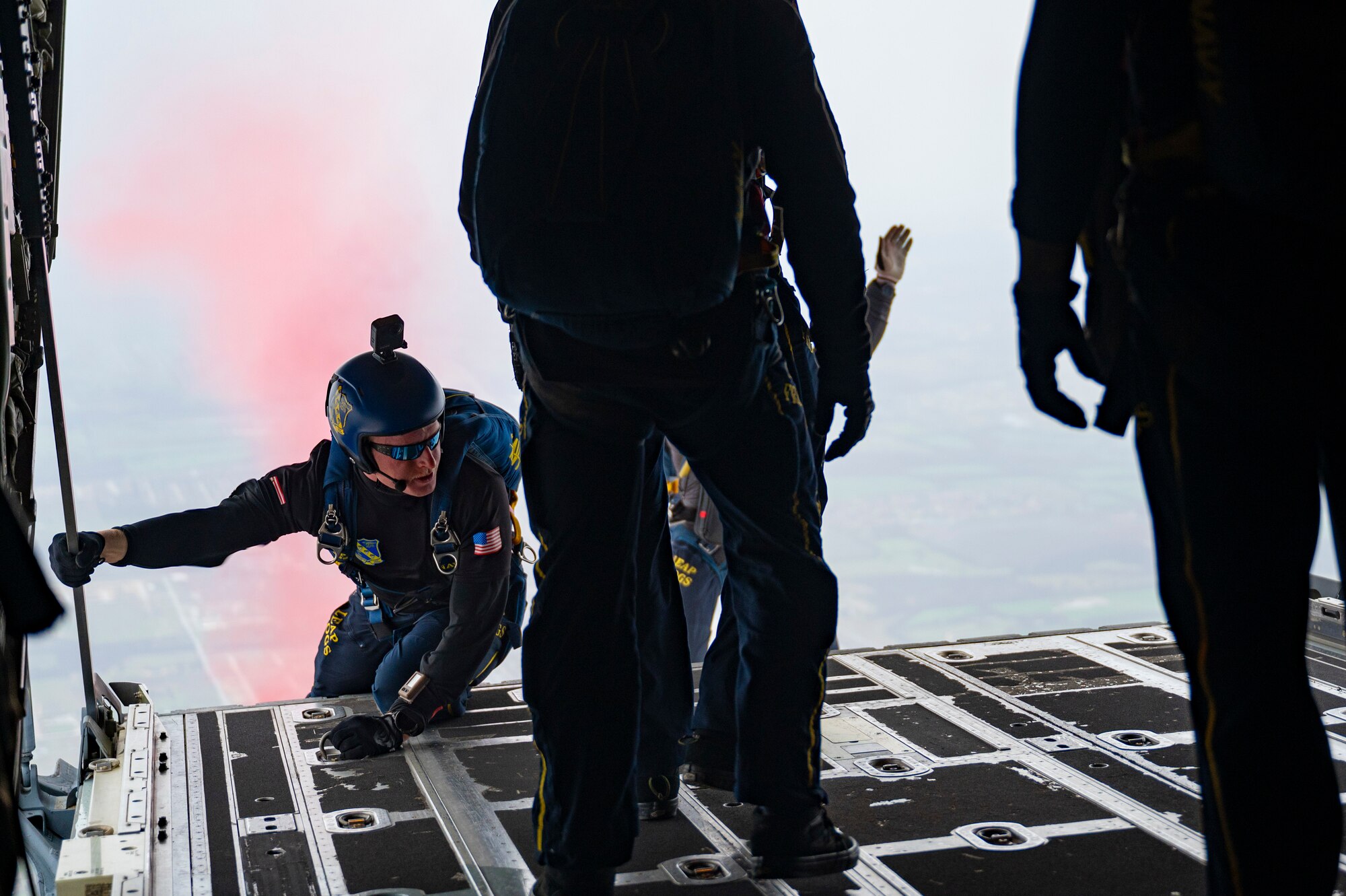 The U.S. Navy Parachute Team “Leap Frogs” complete a demonstration in Texas, Feb. 10, 2023. The Navy Parachute Team is made up of active-duty Navy SEALs , Special Warfare Combat Crewmen (SWCC), Explosive Ordnance Disposal (EOD) Technicians, Navy Divers (ND) and support personnel. The Navy Parachute Team began in 1969 when Navy SEALs and Underwater Demolition Team (UDT) members volunteered at weekend air shows. The team was officially commissioned the Leap Frogs in 1974 by the Chief of Naval Operations with the mission to demonstrate Navy excellence throughout the United States. (U.S. Air Force photo by Airman 1st Class Emma Anderson)