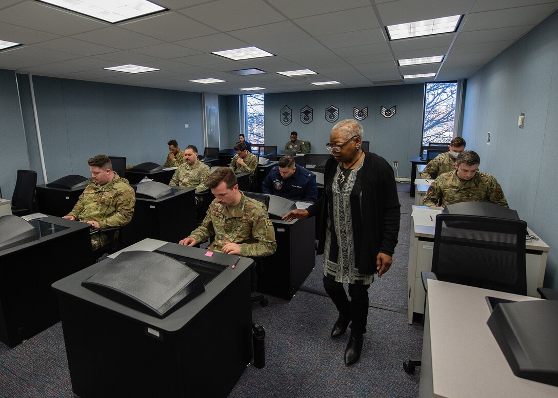 Nancy Floyd, 316th Force Support Squadron test control officer, instructs the Technical Sergeant cycle testing group before the Electronic Weighted Airman Promotion System test at Joint Base Andrews, Md., Feb. 20, 2024.