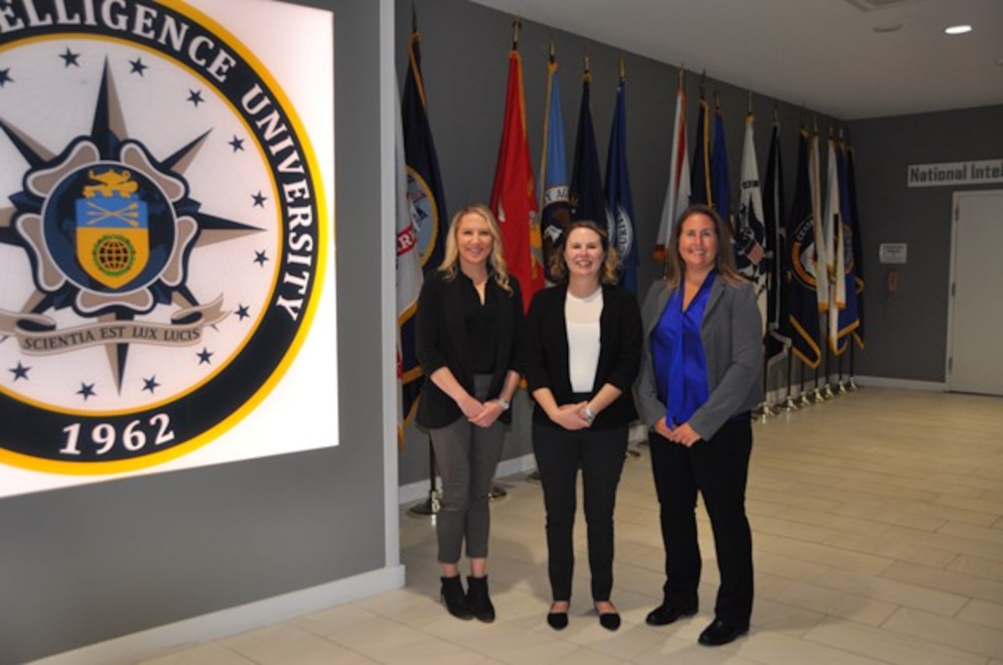 Majs. Rachel Ringgenberg, Hannah Johnson and Traci Arnold are on track to graduate from the National Intelligence University's full-time master's program in June. (courtesy photo)