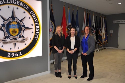 Majs. Rachel Ringgenberg, Hannah Johnson and Traci Arnold are on track to graduate from the National Intelligence University's full-time master's program in June. (courtesy photo)