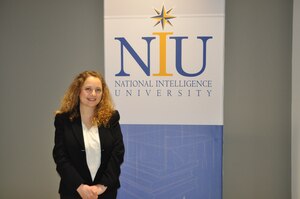 Staff Sgt. Stephanie Kirk is completing cutting-edge thesis research into technology transfer laws and regulations to prevent adversary access to vital national security technologies at the National Intelligence University. (courtesy photo)