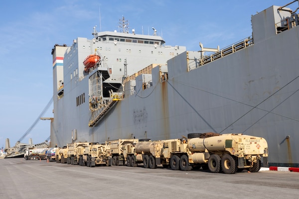 Reserve component Sailors Information Systems Technician 2nd Class Willis Bueno, left, Expeditionary Port Unit (EPU) Atlantic; Boatswain’s Mate 1st Class Ray McAuliffe, EPU Atlantic; and Hospital Corpsman 1st Class Jasper Ramos, Military Sealift Command (MSC) Headquarters; walk down the ramp of MSC chartered ship MV Cape Horn (T-AKR 5068) during an offload for exercise Cobra Gold 2024 at Sattahip, Thailand, Feb. 20. CG24 is the 43rd iteration of the Joint Cobra Gold series of exercises. CG24 emphasizes coordination on readiness, civic action, humanitarian assistance and disaster relief, and seeks to expand regional cooperation and collaboration in these vital areas. MSC directs and supports operations for approximately 140 civilian-crewed ships that replenish U.S. Navy ships at sea, conduct specialized missions, preposition combat cargo at sea around the world, perform a variety of support services, and move military equipment and supplies to deployed U.S. forces. (Photo by Grady T. Fontana)