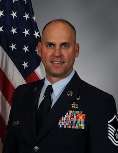 Master Sgt. Mark Hilleren poses for a studio portrait October 18, 2023.