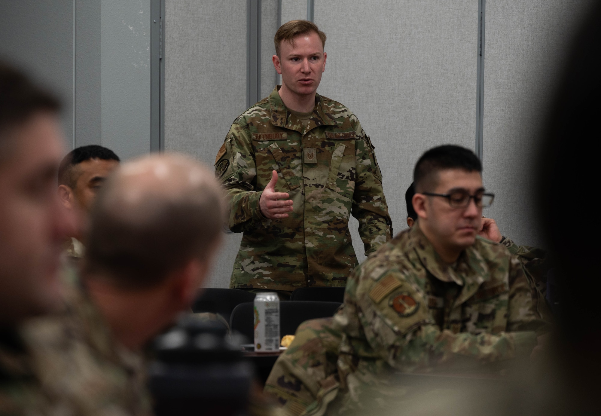 U.S. Air Force Tech. Sgt. Author Rifenbury, 5th Maintenance Squadron crew chief, asks a question during the First Sergeant Symposium at Minot Air Force Base, North Dakota, Feb. 23, 2024. The First Sergeant Symposium allowed Minot Airmen to gain valuable tools and resources needed to step into the role of a first sergeant. (U.S. Air Force photo by Airman 1st Class Luis Gomez)