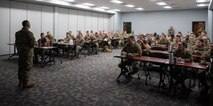 Minot Airmen attending the First Sergeant Symposium listen to the Article 15 process panel at Minot Air Force Base, North Dakota, Feb. 22, 2024. The First Sergeant Symposium allowed Minot Airmen to gain valuable tools and resources needed to step into the role of a first sergeant. (U.S. Air Force photo by Airman 1st Class Luis Gomez)