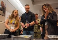 A team of DoD STEM Ambassadors tests their homemade rescue device in West Bethesda, Md., on Feb. 22, 2024.