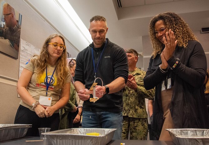 A team of DoD STEM Ambassadors tests their homemade rescue device in West Bethesda, Md., on Feb. 22, 2024.