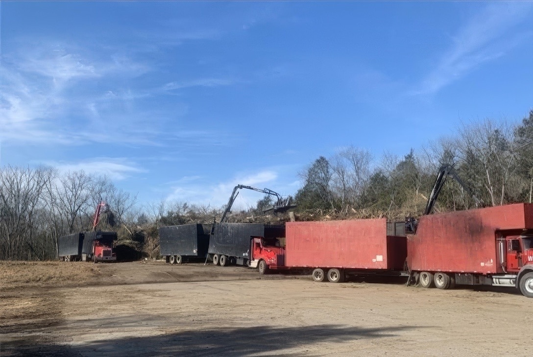 Vegetative debris resulting from the severe storms that struck west and middle Tennessee is offloaded from trucks, Jan. 9, 2024 in Hendersonville, Tennessee